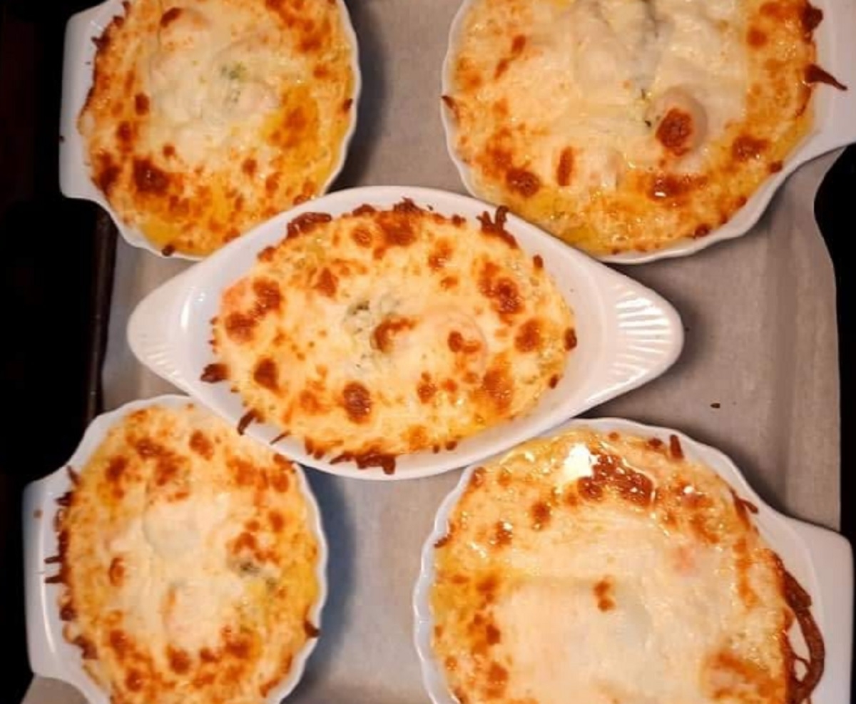 Recette: Coquilles de poisson et crevettes gratin�es.