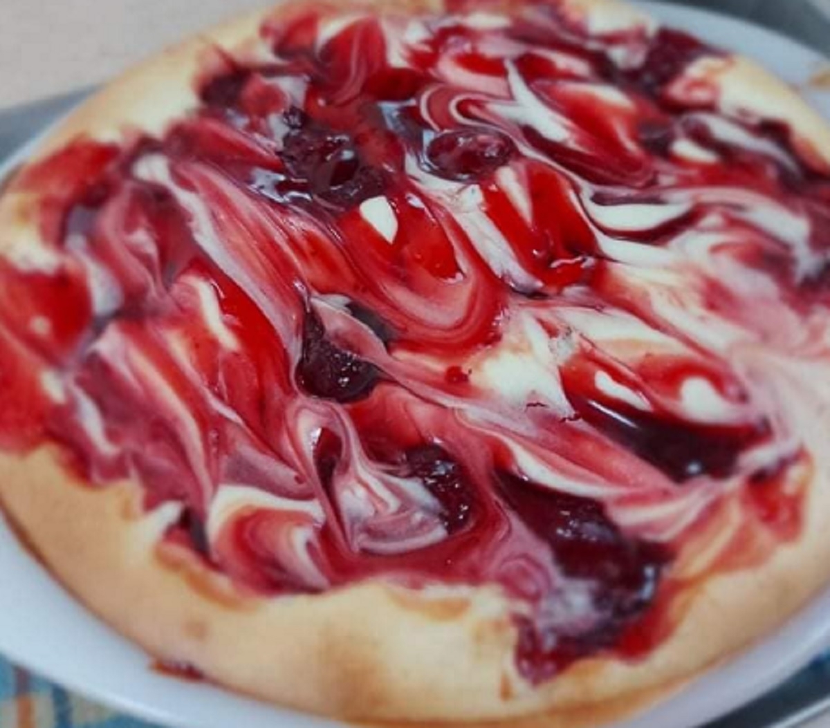Recette: Tarte au fromage et tourbillon de cerises.