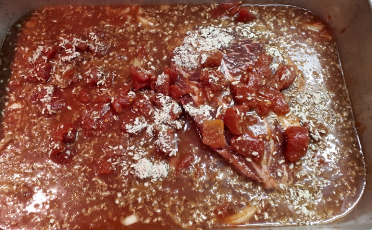 Recette: Rti de palette aux tomates en ds et  l'oignon.