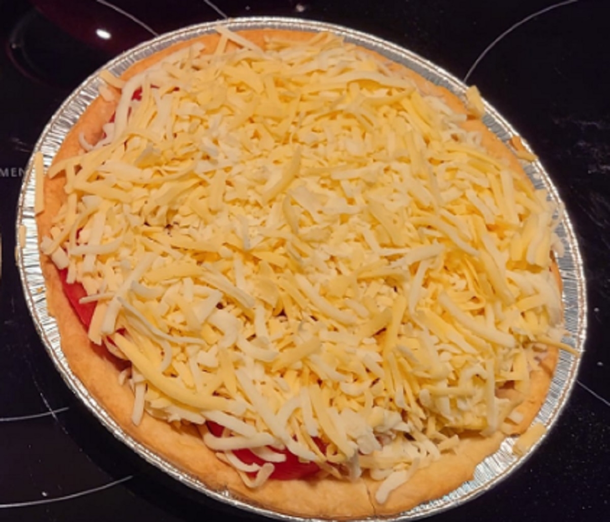 Recette: Tarte aux tomates et aux oignons.