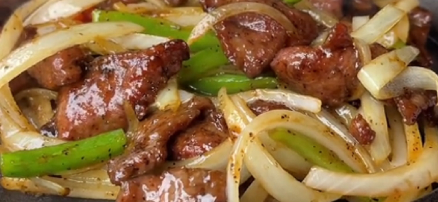 Recette: Saut� de boeuf aux poivrons et aux oignons.