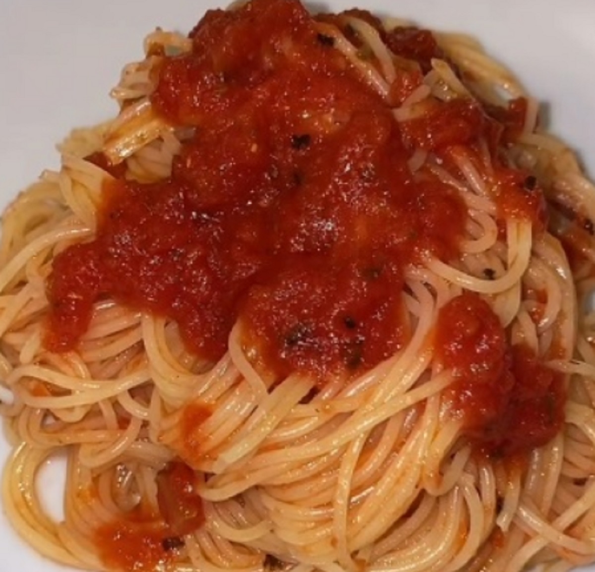 Recette: Spaghetti sauce tomate.